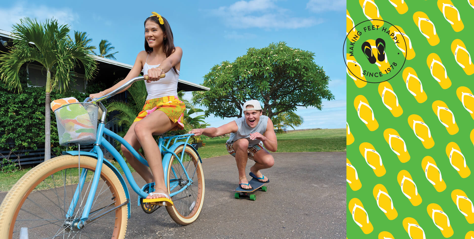 Guy and girl playing on a bike and skateboard wearing Locals slippahs