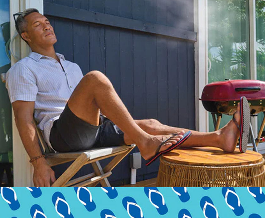 Man sleeping on a lanai wearing Locals slippahs